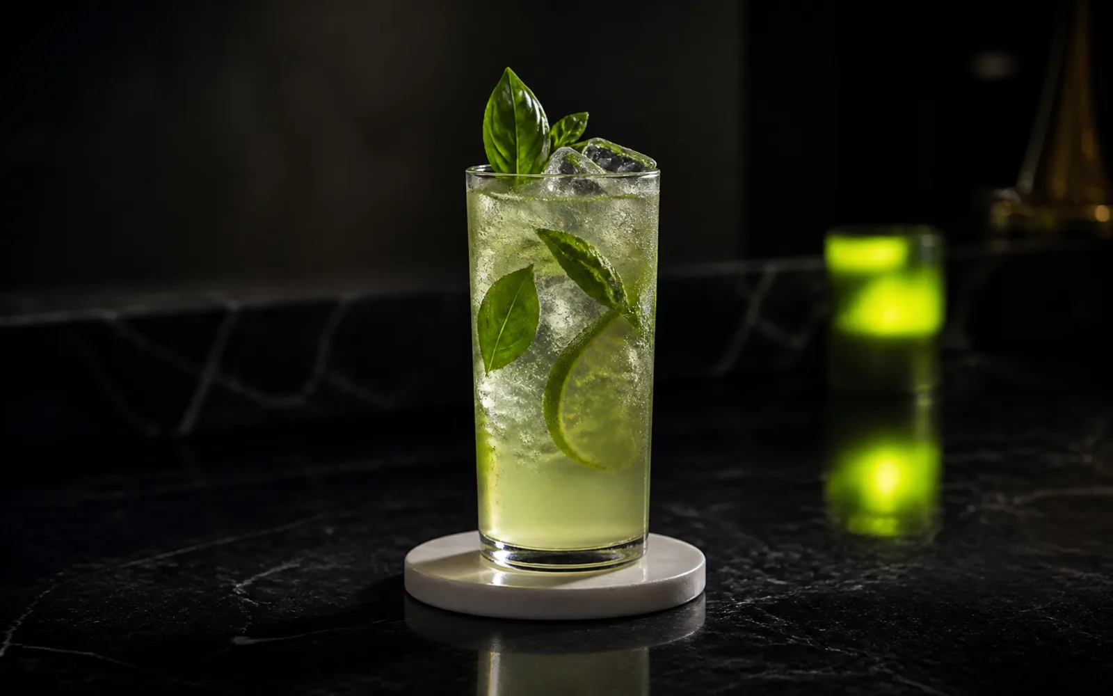 Concept preview of a zero-proof herbal highball with basil, lime and clear ice
