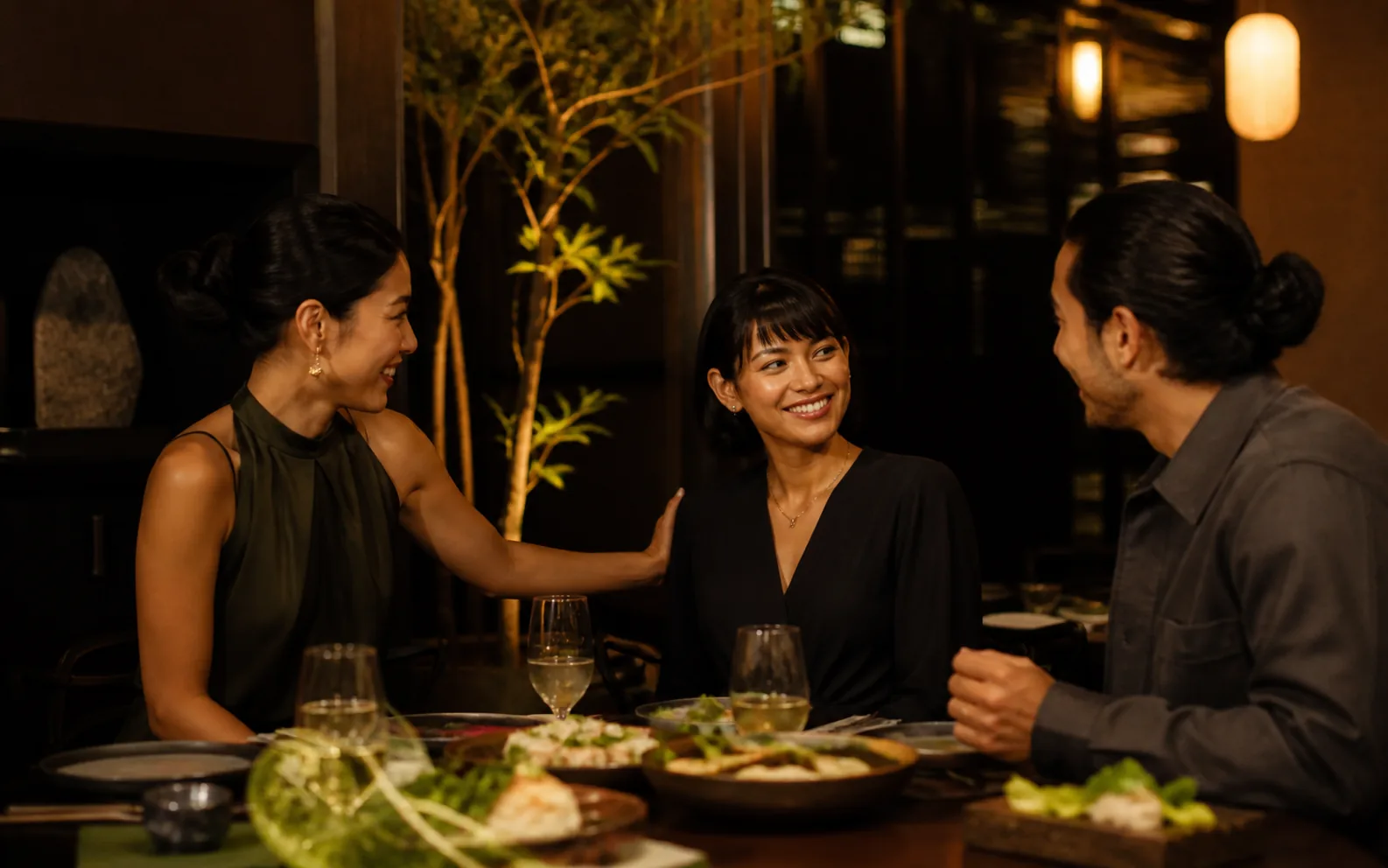 Concept preview of friends being introduced over shared plates