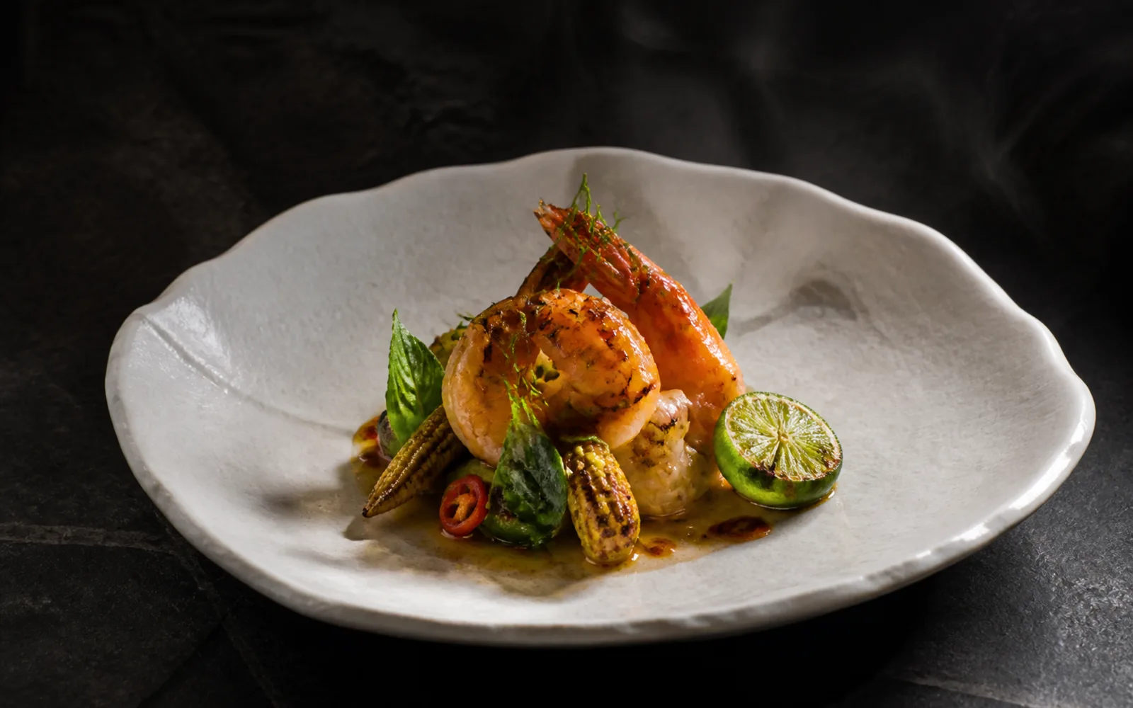Concept preview of Thai-Japanese grilled prawns with Thai herbs, chile and lime